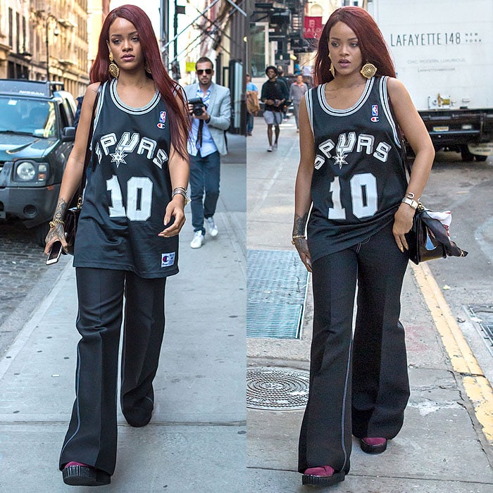 Rihanna sporting Dennis Rodman's San Antonio Spurs jersey paired with white-stitched flare pants
