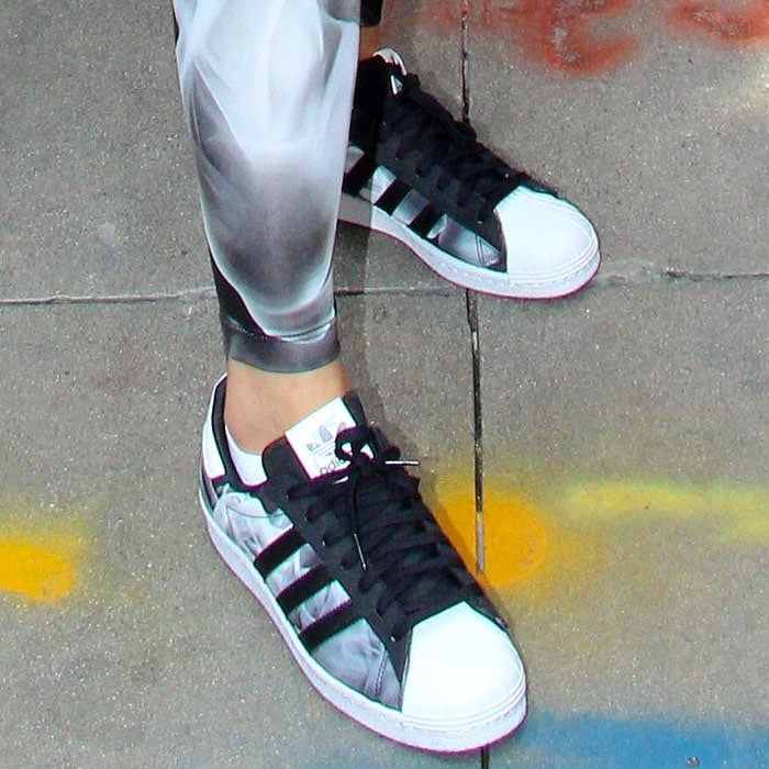 Rita Ora's smoke-print adidas x Rita Ora "Superstar 80s" sneakers are part of the pop singer's new collection