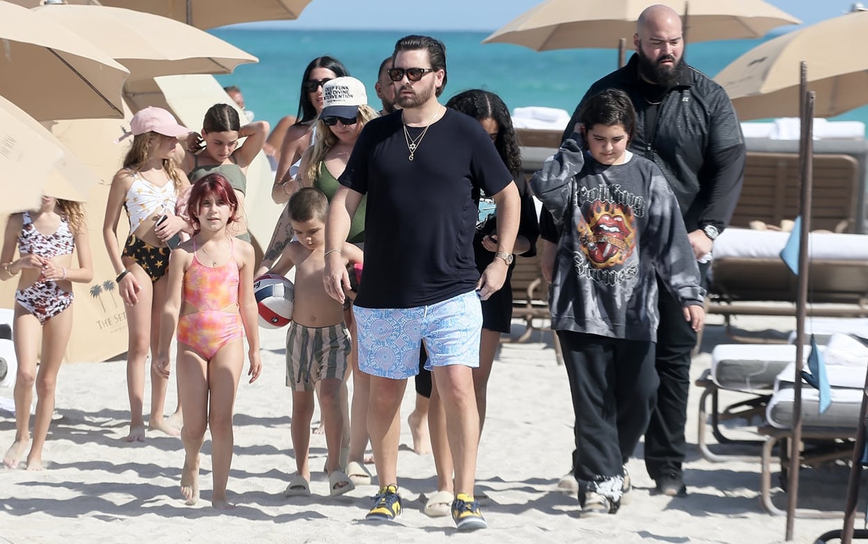 Scott Disick looks relaxed as he spends time with his three children, Mason Disick, Penelope Disick, and Reign Disick, on the beach in Miami