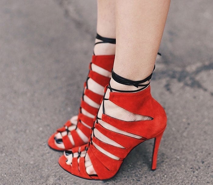 Silvia's bright red lace-up shoes
