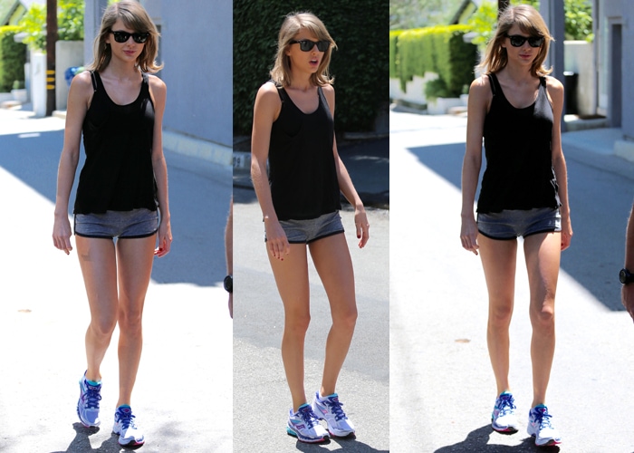 Taylor Swift Taylor wore a sheer tank top, running shorts, and a pair of wayfarers