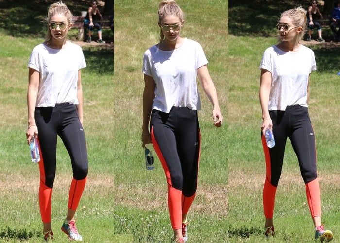 Gigi Hadid rocking Saucony Type A6 running shoes, New Balance Accelerate tights, and Le Specs Vertigo sunglasses