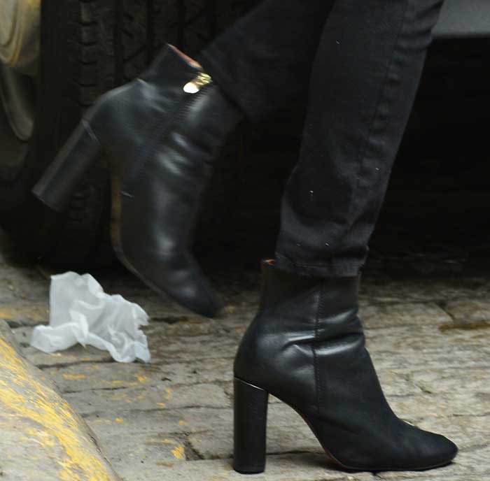 Taylor Swift wearing Topshop Magnum boots