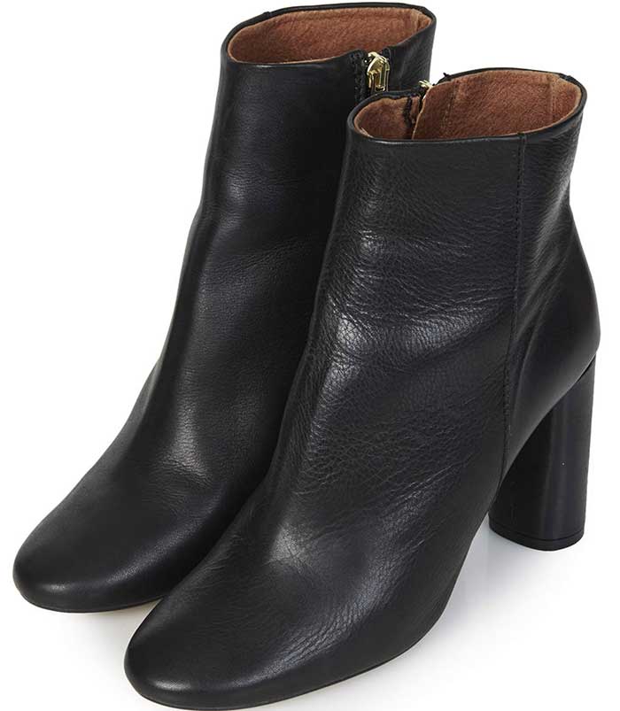Super sleek and chic, this refined ankle boot is crafted from the softest leather and features an almond toe and wrapped, architectural heel for a richly polished look