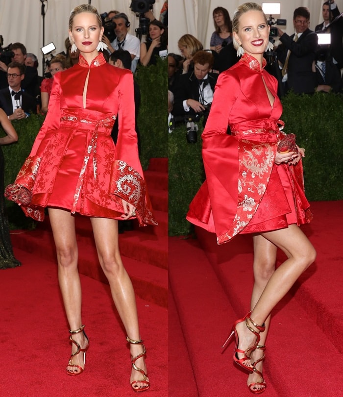 Karolina Kurkova flaunts her gorgeous legs in a red kimono-style mini dress designed by Tommy Hilfiger