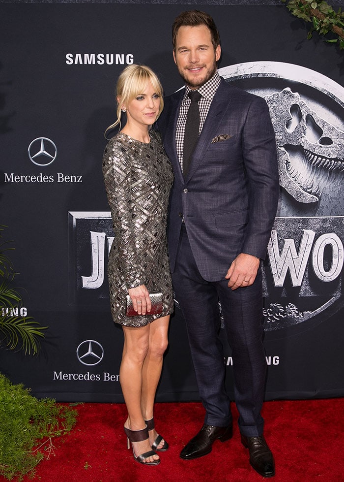 Chris Pratt, posing with Anna Faris, in a checkered shirt and a black tie underneath