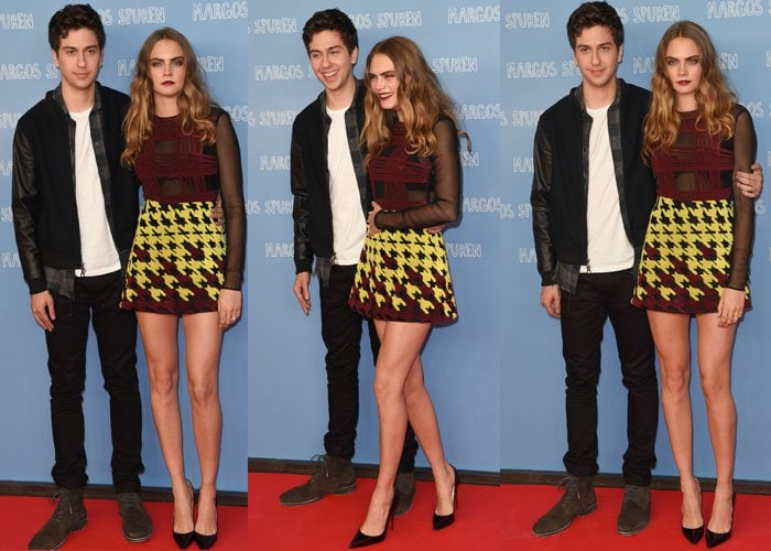 Cara Delevingne poses on the red carpet with her co-star Nat Wolff