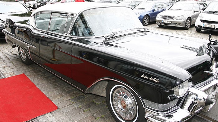 Cara Delevingne arriving in a classic Cadillac at SAT.1 TV studios to promote “Paper Towns” on the German TV show “Frühstücksfernsehen”