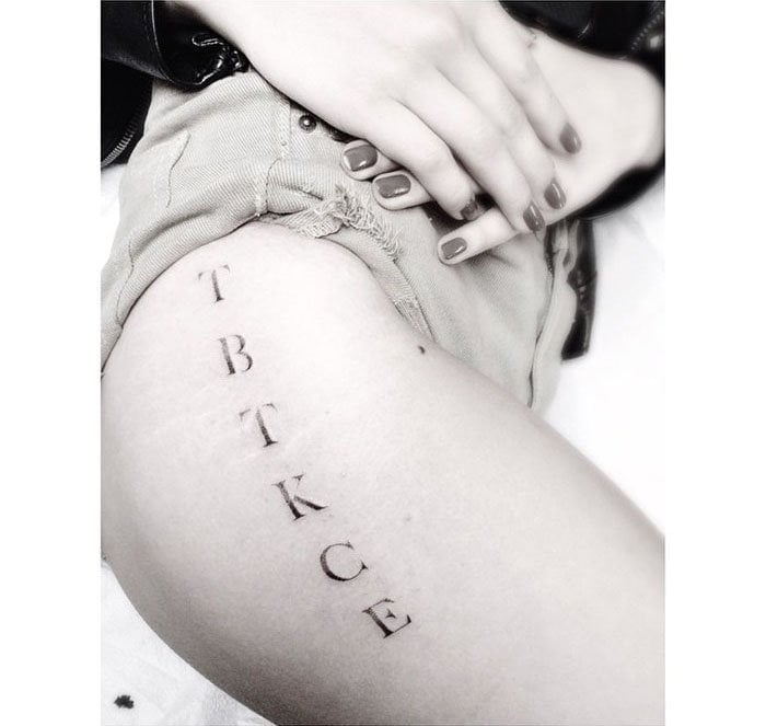 Chloe Moretz's TBTKCE upper thigh tattoo by Dr. Woo