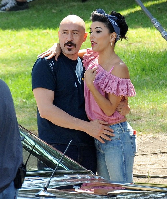 Eva Longoria filming an affectionate scene with Mexican-American actor Demián Bichir Nájera
