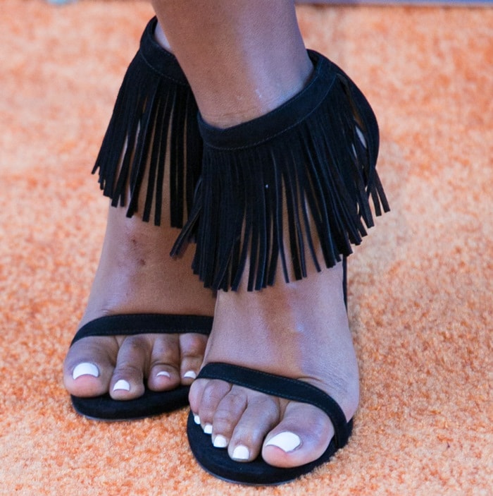 Janelle Monáe Robinson's sexy toes in sandals with fine fringe accents