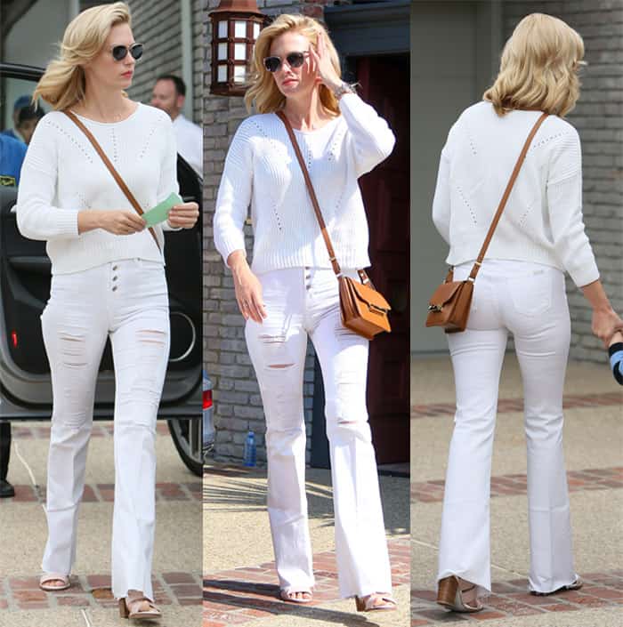 January Jones in white flared jeans with ripped thighs