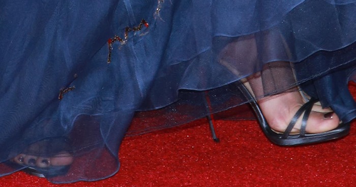 Jennifer Lopez shows off her feet in Christian Louboutin shoes