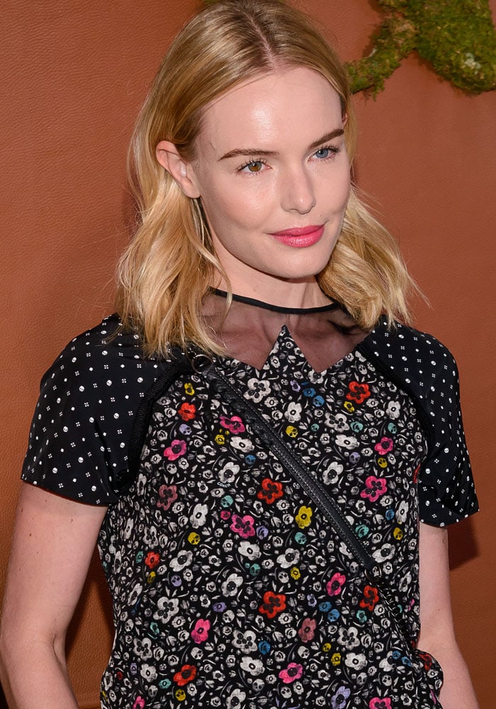 Kate Bosworth stuns in a whimsical floral-print top with delicate mesh detailing at the neckline