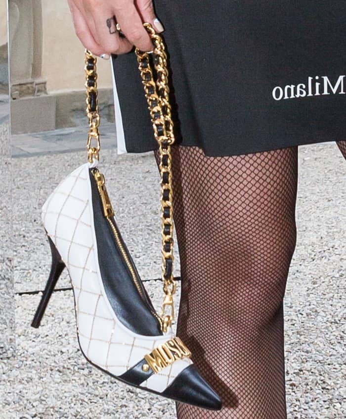 Katy Perry elevates her look with the playful and unique Moschino pump bag