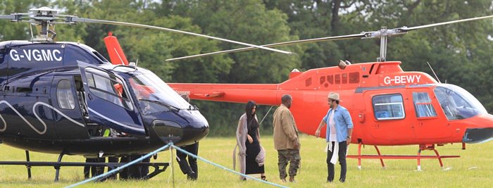 Kim Kardashian and Kanye West arriving in Glastonbury via helicopter