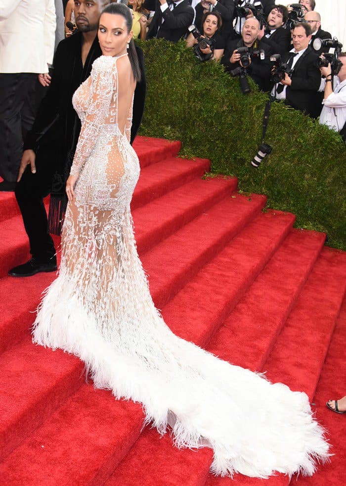 Kim wore a stunning sheer white gown designed by Peter Dundas for Roberto Cavalli
