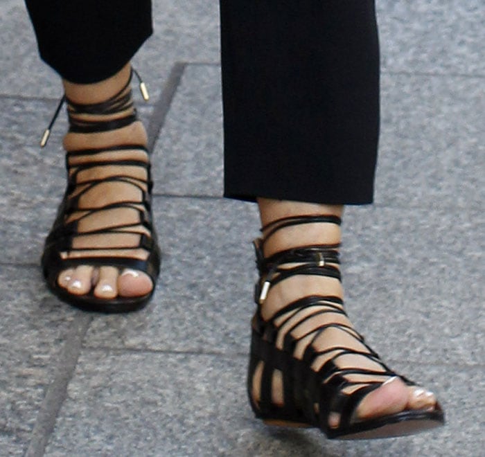 Kris Jenner's hot feet in black Aquazzura sandals