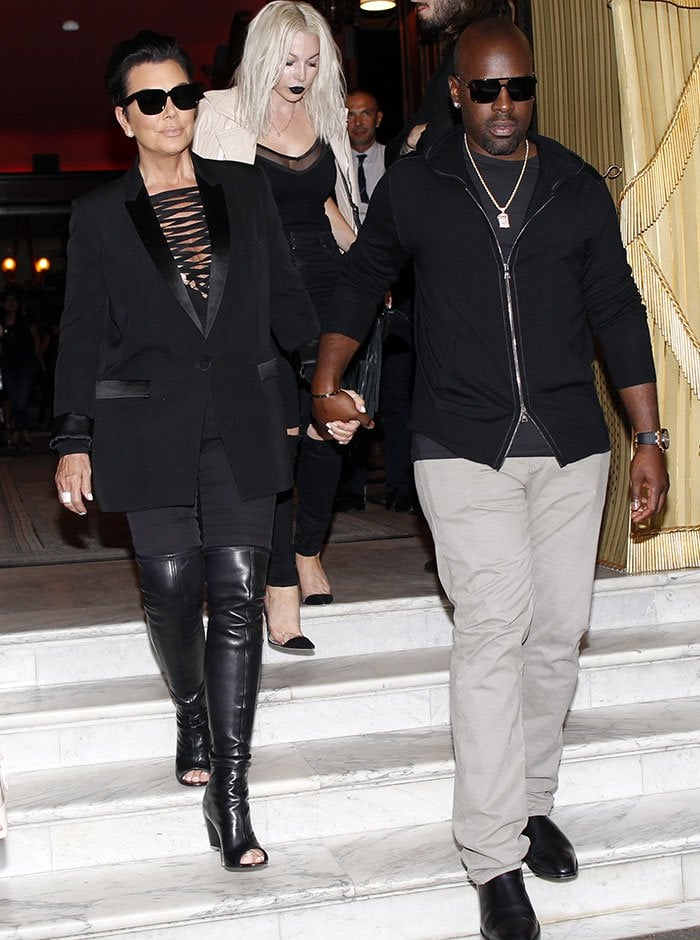 Kris Jenner holding hands with Corey Gamble as they are spotted out for dinner