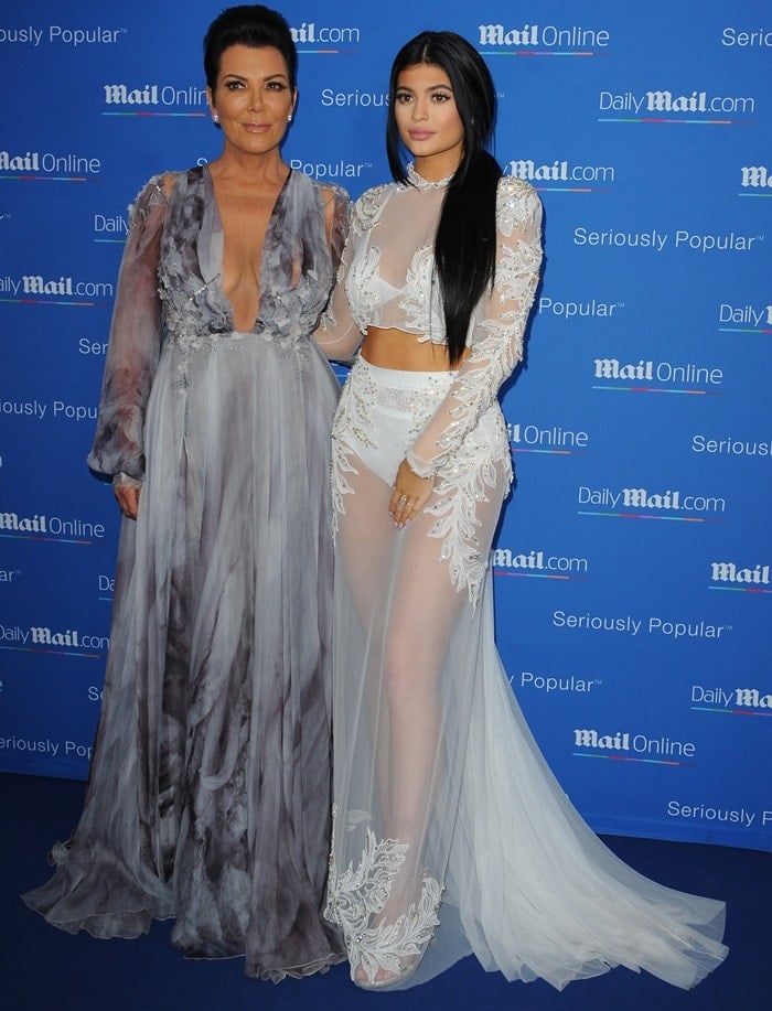Kylie's mom Kris Jenner stunned in a low-plunging dove-grey maxi dress