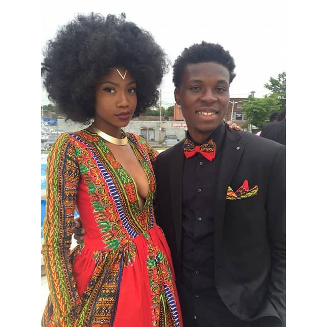 Kyemah McEntyre and her prom date coordinate perfectly, showcasing her striking, self-designed African-inspired gown alongside his matching accents