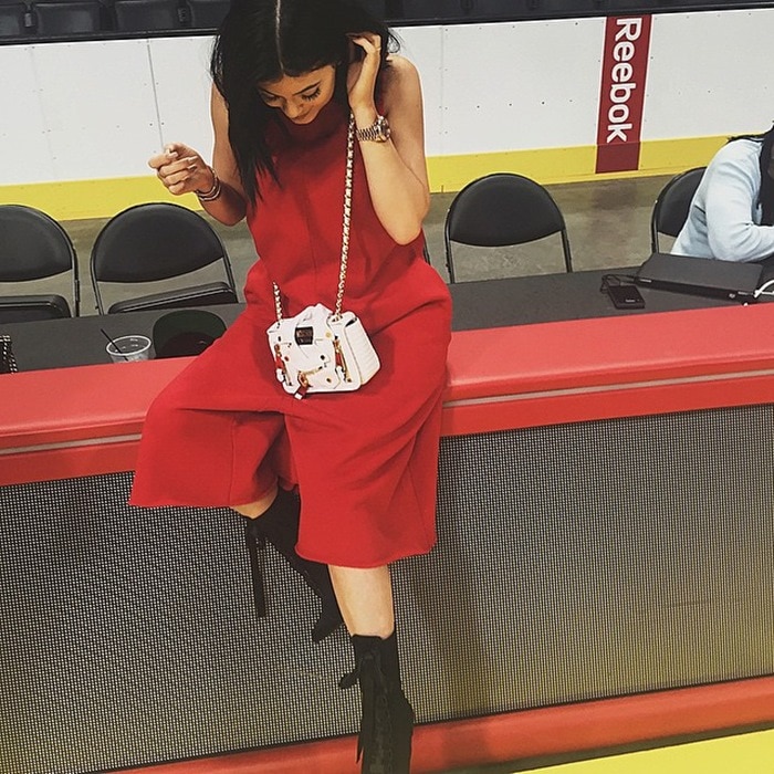 Kylie Jenner's bold sleeveless crimson jumpsuit