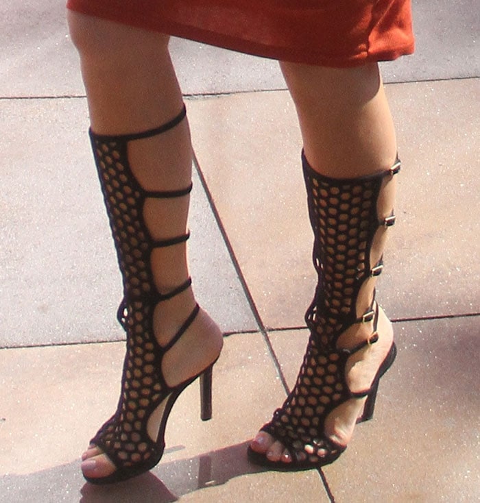 Kylie Jenner in Tamara Mellon cage sandals