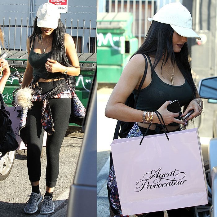 Kylie Jenner heads to her Mercedes-Benz G-Wagon after shopping at an Agent Provocateur boutique