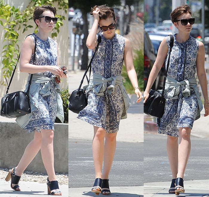 Lily Collins flaunted her legs in a sleeveless floral-print dress