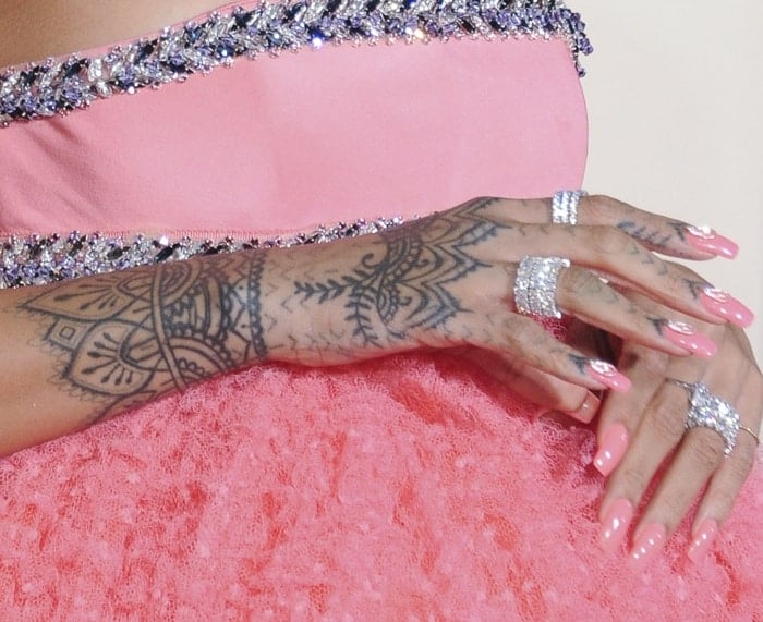Inspired by Indian henna art, Rihanna's hand tattoo is a combination of a Maori tribal design and chevron lines