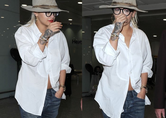 Rita Ora has a black rose tattooed on her hand