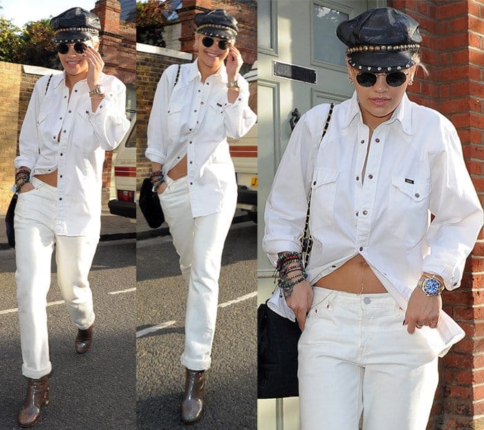 Rita Ora wears white boyfriend jeans with a matching shirt