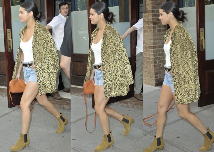 Selena Gomez flaunts her legs in a long patterned jacket