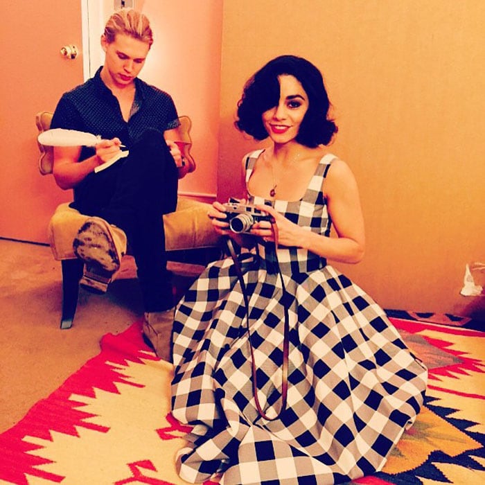 Vanessa poses for a photo in her gingham dress