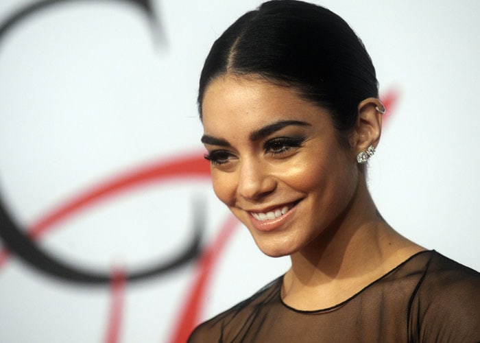 Vanessa Hudgens shows off her diamond earrings