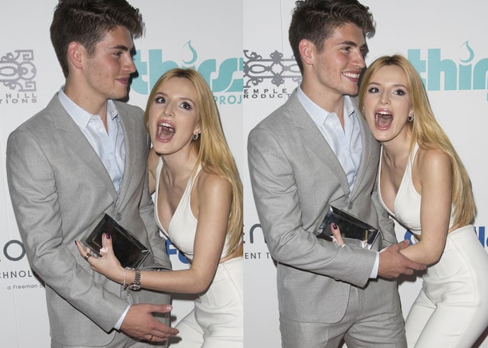 Bella Thorne and Gregg Sulkin joke around during a photo opportunity at the Thirst Gala