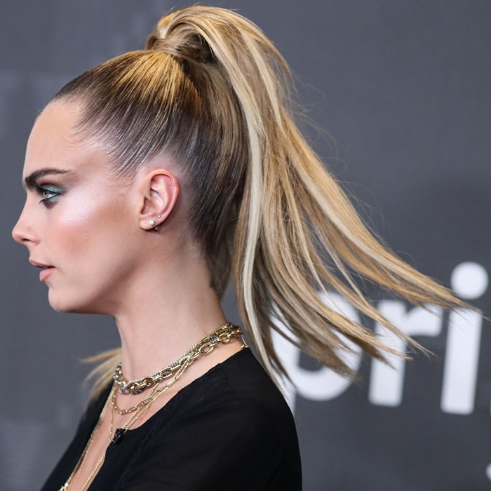 Cara Delevingne's left ear