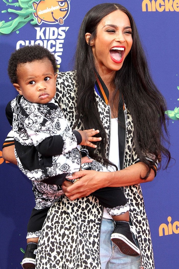 Ciara laughing while holding 14-month-old son, Future Zahir Wilburn