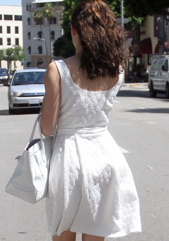 Emmy Rossum looked pretty in an all-white outfit