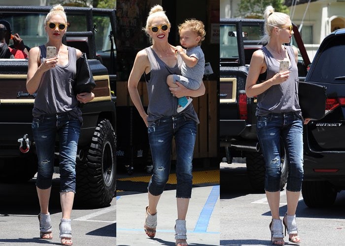 Gwen Stefani rocks a sleeveless top and ripped jeans for her outing with her kids