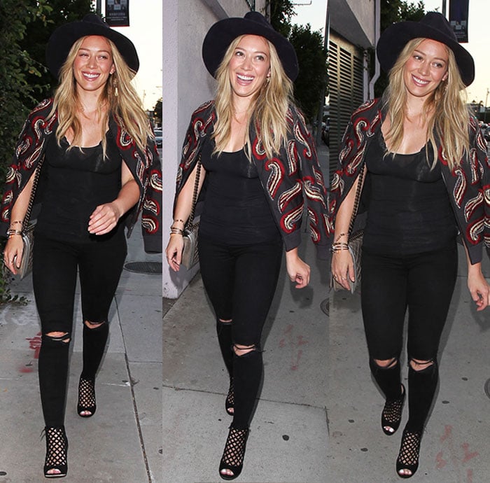 Hilary Duff lets her long blonde hair flow in loose waves as she heads out for dinner