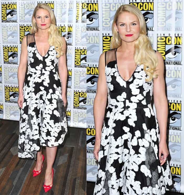 Jennifer Morrison wearing a striking sleeveless black and white sheer flower Lela Rose embroidered dress featuring a V-neckline and an asymmetrical hemline at the 'Once Upon a Time' press room