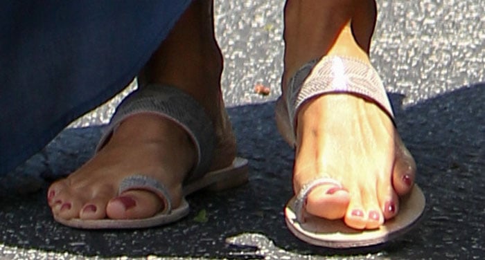 Jessica Alba shows off her feet in snakeskin toe-ring flats