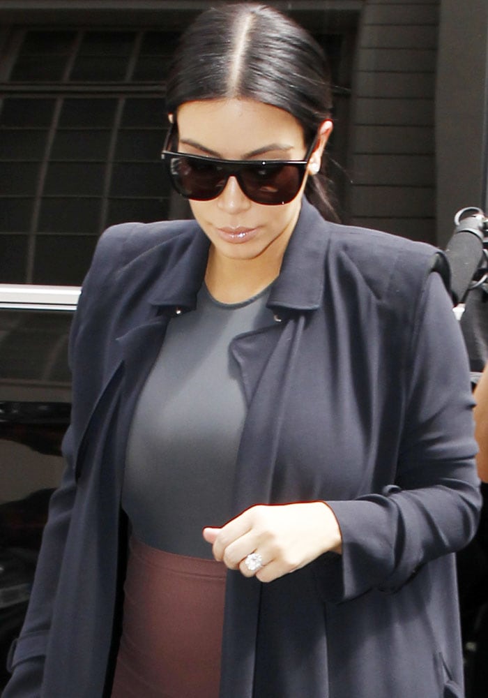 Kim Kardashian stepped out in a figure-hugging color block dress