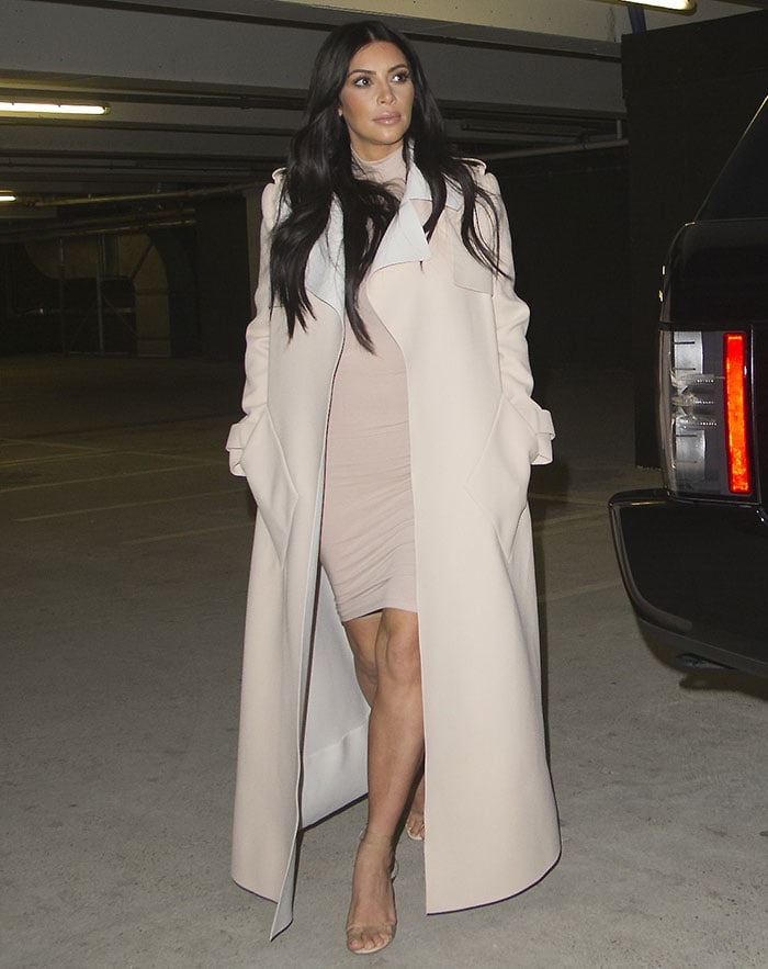 Kim Kardashian's nude fitted dress with a matching coat and a pair of heels