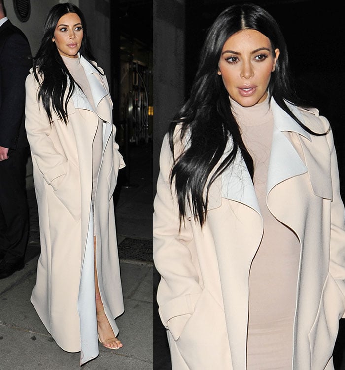 Kim Kardashian wore her raven hair down with a center parting