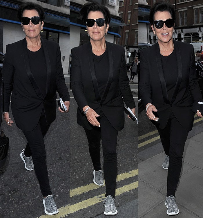 Reality star Kris Jenner hides her eyes behind a pair of dark shades as she leaves a London fashion shoot