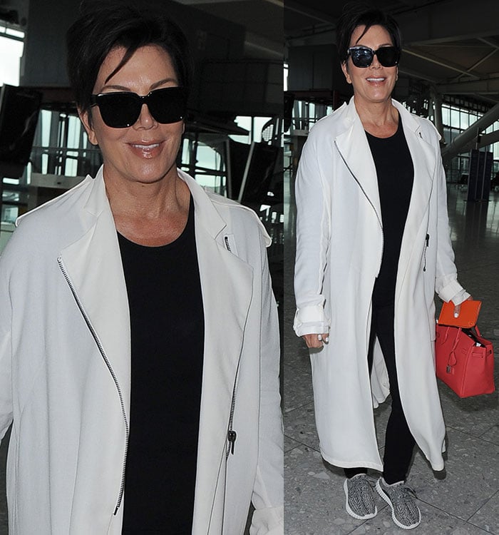 Kris Jenner was all smiles as she casually strolled through the airport, rocking her signature black look with her dark pixie cut