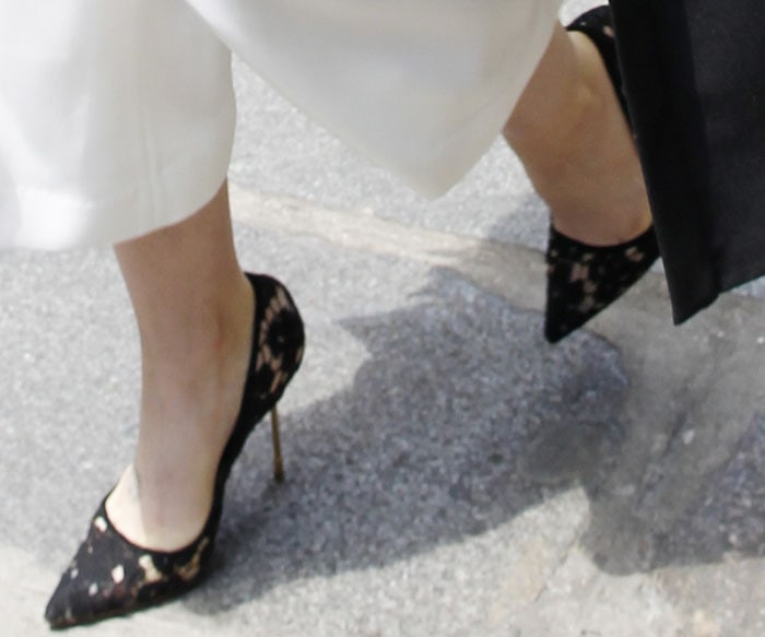 Lily Collins wears black lace Kurt Geiger heels