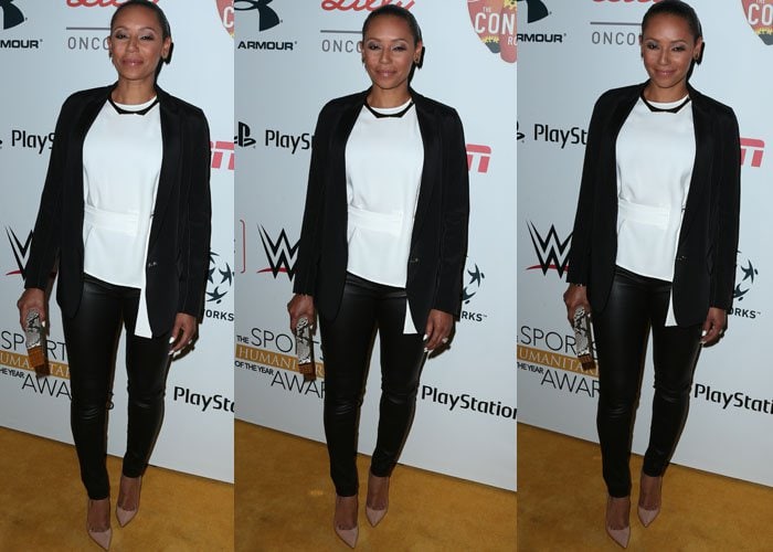 Mel B pairs sleek leather pants with a structured white peplum top and black blazer, finishing the look with nude So Kate pumps that elongate her legs beautifully